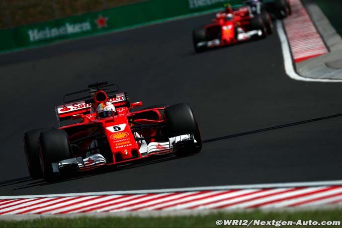 Vettel victorious as Ferrari claim (...)