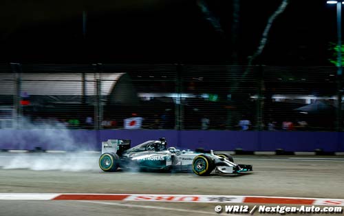 Hamilton snatches pole from Rosberg in